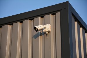 security camera on grey metal building